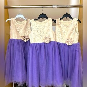 Three cream lace top with lined purple skirt - sizes 3T, 5T and 6/6X.